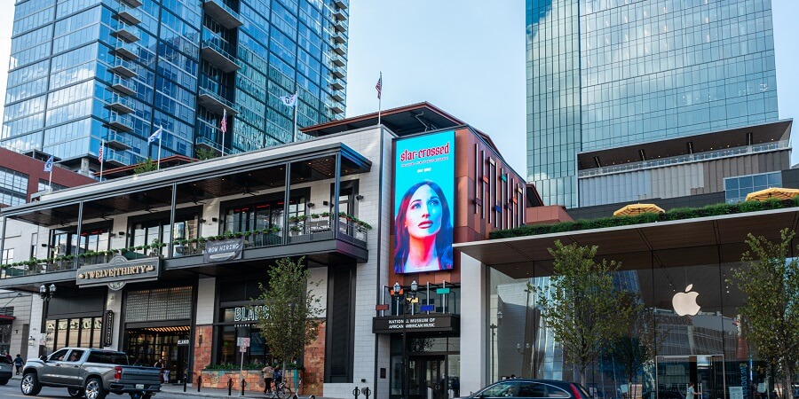 An example of a DOOH ad on location at Fifth and Broadway