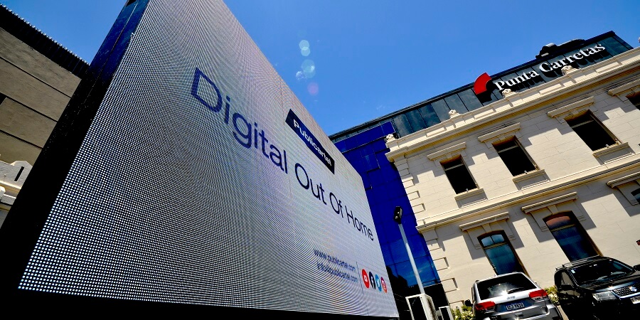 A Publicartel ad that says &quot;Digital out-of-home&quot; on a digital display