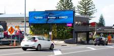 Shows a programmatic ad displayed by LUMO Digital via Broadsign Reach