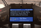 A Washington MetroRail digital display. It shows there will be weeknight work that will cause delays, as well as an elevator outage that passengers should know about. The display also shows current transit line statuses and the time.