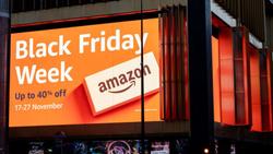 <p>Amazon promotes its Black Friday Week sale via digital OOH (photo by Mike Kemp/In Pictures via Getty Images)</p>
