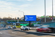 VAST digital billboard beside a busy roadway in Christchurch, New Zealand, displaying the VAST Billboards logo.
